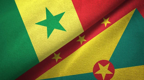 Senegal e Grenada due bandiere tessuto, tessitura tessuto — Foto Stock