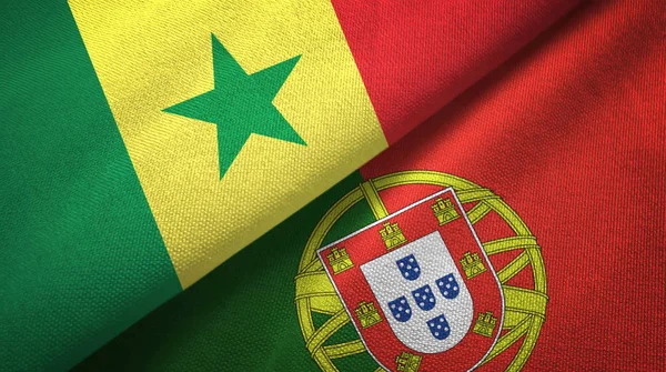 Senegal e Portogallo due bandiere tessuto, tessitura tessuto — Foto Stock