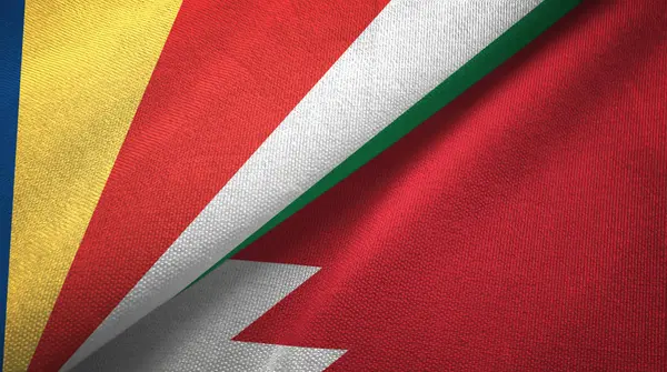 Seychelle-szigetek és Bahrein két zászló Textil szövet, szövet textúra — Stock Fotó