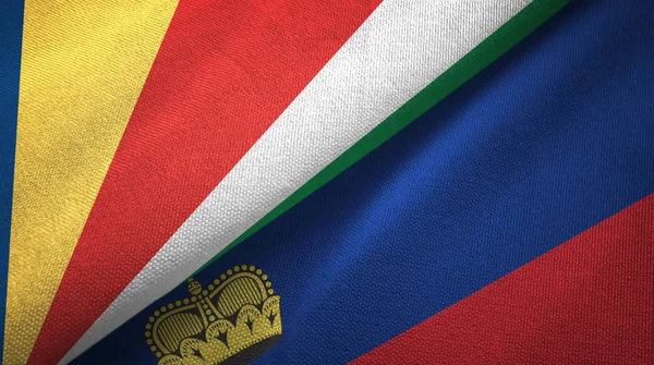 A Seychelle-szigetek és Liechtenstein két zászlókat textil ruhával, szövet textúra — Stock Fotó