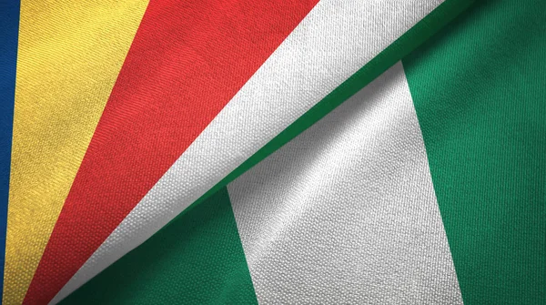 Сейшельські острови і Нігерія два прапори текстильної тканини, текстура тканини — стокове фото
