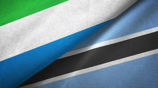 シエラレオネとボツワナの2つの旗織物布、生地の質感 — ストック写真