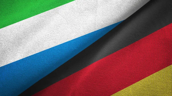 Sierra Leone e Germania due bandiere tessuto, tessitura tessuto — Foto Stock