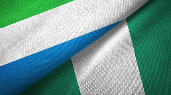 Sierra Leone och Nigeria två flaggor textil trasa, tyg konsistens — Stockfoto