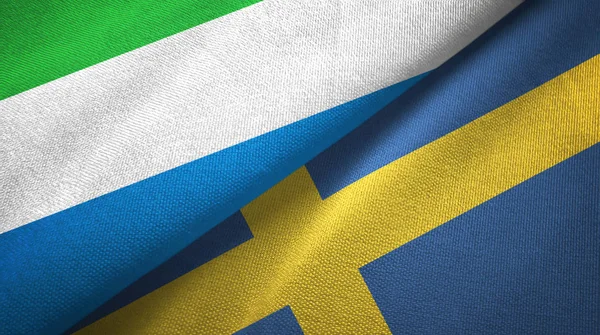 Sierra Leone and Sweden two flags textile cloth, fabric texture — Stock Photo, Image