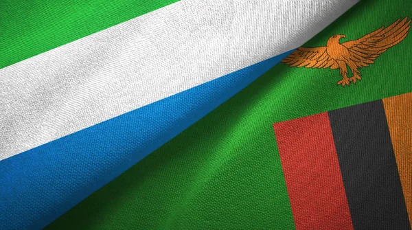 Sierra Leone e Zambia due bandiere tessuto, tessitura tessuto — Foto Stock