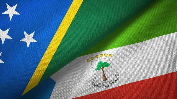 Salomons eiland en Equatoriaal-Guinea twee vlaggen textiel doek, stof textuur — Stockfoto
