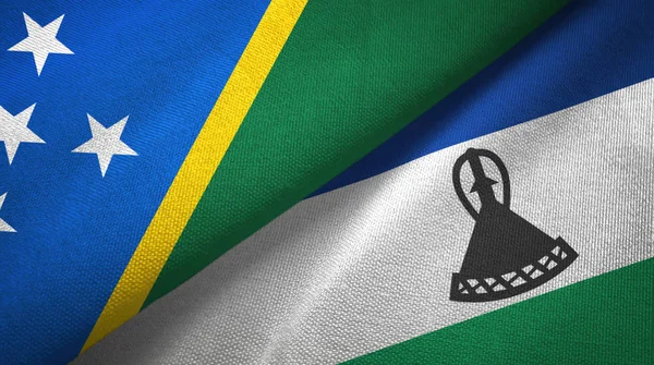 Το νησί του Σολομώντα και το Λεσότο δύο σημαίες υφάνσιμα υφάσματα, υφή υφάσματος — Φωτογραφία Αρχείου