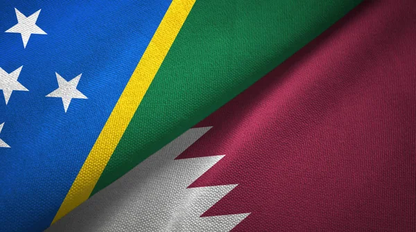Solomon Island and Qatar two flags textile cloth, fabric texture