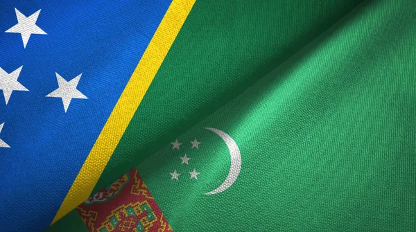 Solomon Island and Turkmenistan two flags textile cloth, fabric texture