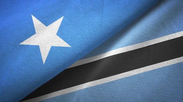 Somalia and Botswana two flags textile cloth, fabric texture — Stock Photo, Image