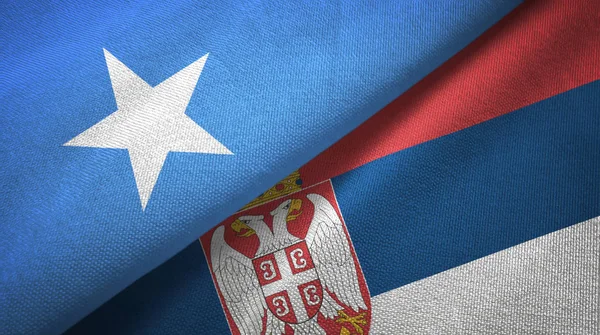 Somalia and Serbia two flags textile cloth, fabric texture — Stock Photo, Image