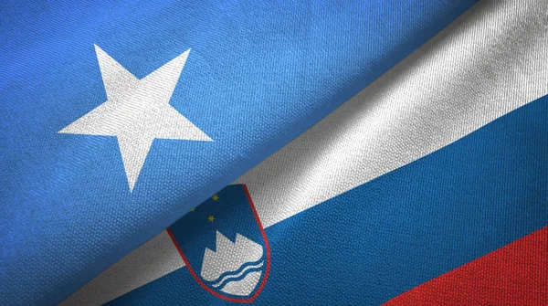 Somalien und Slowenien zwei Flaggen Textiltuch, Textilstruktur — Stockfoto