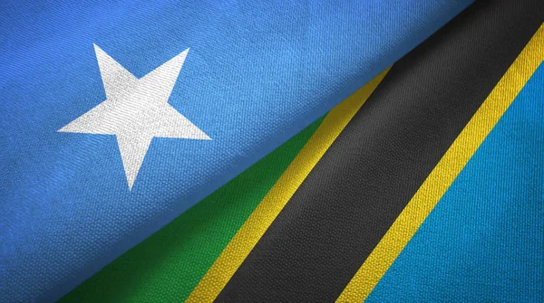 Somalien und Tansania zwei Flaggen Textilstoff, Textur — Stockfoto