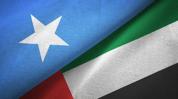 Somalia y Emiratos Árabes Unidos dos banderas tela textil, textura de la tela — Foto de Stock