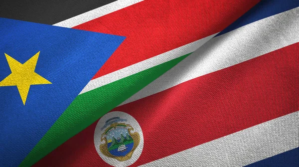 South Sudan and Costa Rica two flags textile cloth, fabric texture — Stock Photo, Image