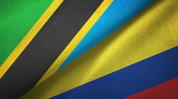 Τανζανία και Κολομβία δύο σημαίες ύφασμα υφασμάτων, υφή υφάσματος — Φωτογραφία Αρχείου
