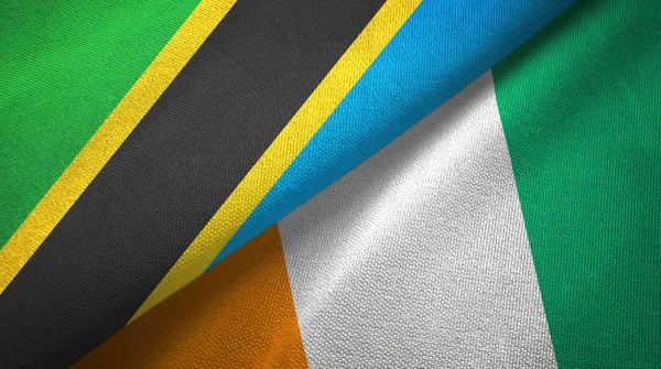 Tanzania and Cote dIvoire Ivory coast two flags textile fabric texture — Stock Photo, Image