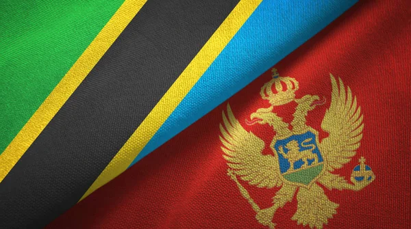 Tanzania och Montenegro två flaggor textil trasa, tyg konsistens — Stockfoto