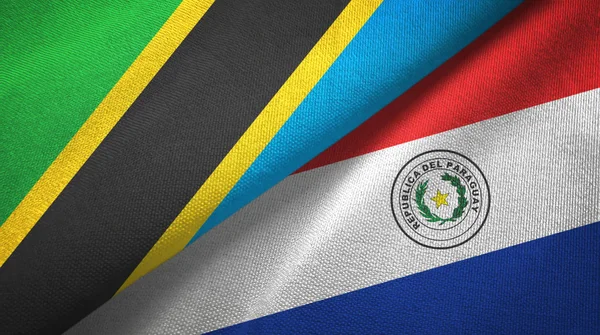 Tanzânia e Paraguai duas bandeiras de pano têxtil, textura de tecido — Fotografia de Stock