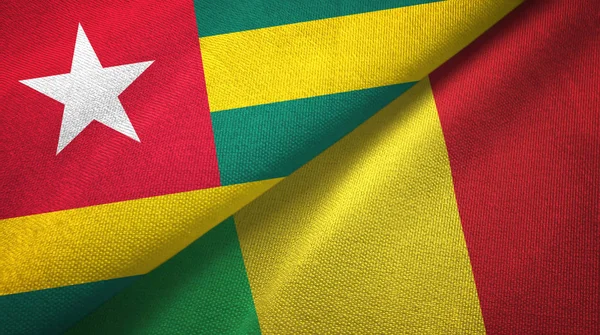 Togo en Mali twee vlaggen textiel doek, weefsel textuur — Stockfoto