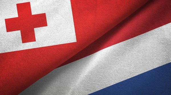 Tonga e Paesi Bassi due bandiere tessuto, tessitura tessuto — Foto Stock