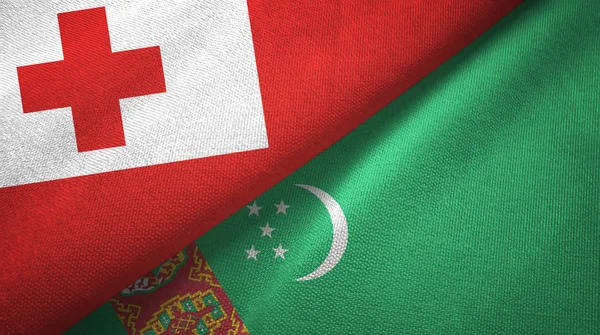 Tonga and Turkmenistan two flags textile cloth, fabric texture