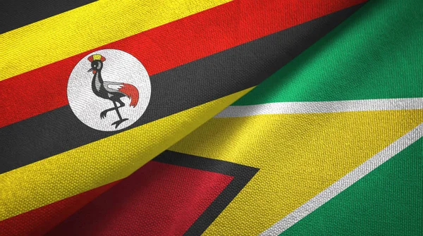 Uganda ve Guyana iki bayraklar tekstil kumaş, kumaş doku