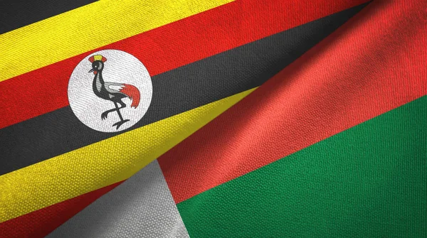 Uganda ve Madagaskar iki bayraklar tekstil kumaş, kumaş doku