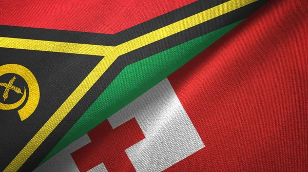 Vanuatu e Tonga due bandiere tessuto, tessitura del tessuto — Foto Stock