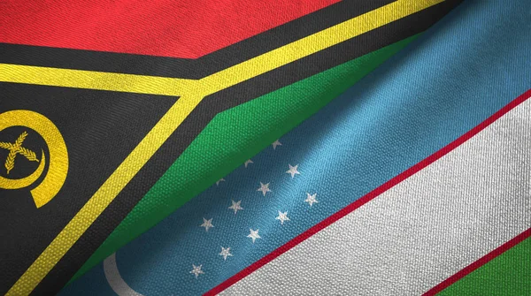 Vanuatu y Uzbekistán dos banderas tela textil, textura de la tela — Foto de Stock