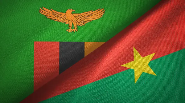 Zambia e Burkina Faso due bandiere tessuto, tessitura del tessuto — Foto Stock
