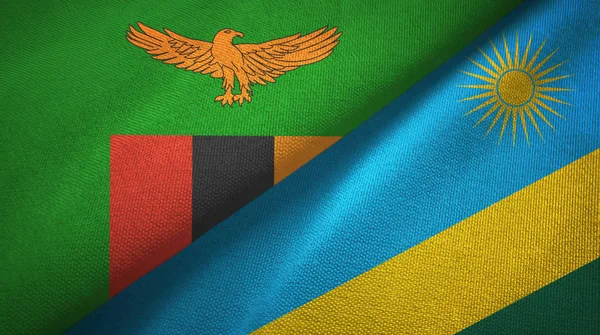 Zambia e Ruanda due bandiere tessuto, tessitura tessuto — Foto Stock