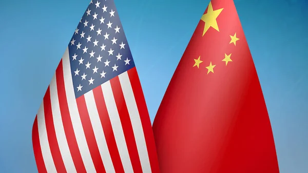 美国和中国的两面旗帜 蓝色背景 — 图库照片