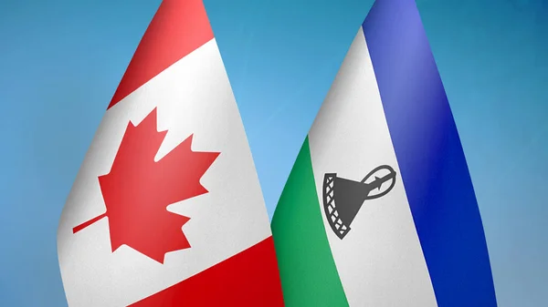 Canada Lesotho Due Bandiere Insieme Sfondo Blu — Foto Stock
