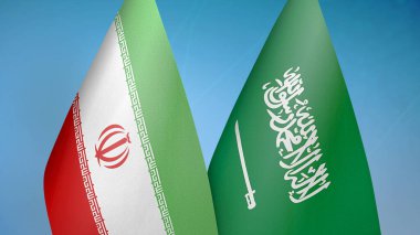 İran ve Suudi Arabistan mavi arka planda iki bayrak