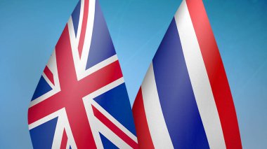 Birleşik Krallık ve Tayland 'da iki bayrak mavi arka planda