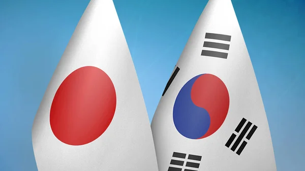 Japonia Korea Południowa Dwie Flagi Razem Niebieskie Tło — Zdjęcie stockowe