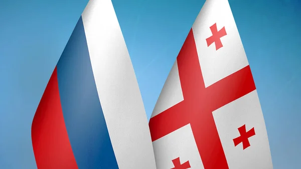 Russland Und Georgien Zwei Flaggen Zusammen Blauer Hintergrund — Stockfoto