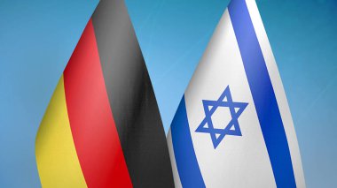 Almanya ve İsrail 'in iki bayrağı mavi arka planda