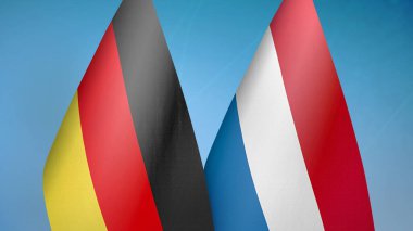 Almanya ve Hollanda iki bayrak birlikte mavi arkaplan