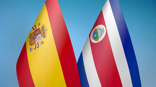 스페인과 코스타리카 깃발을 파란색 배경으로 — 스톡 사진
