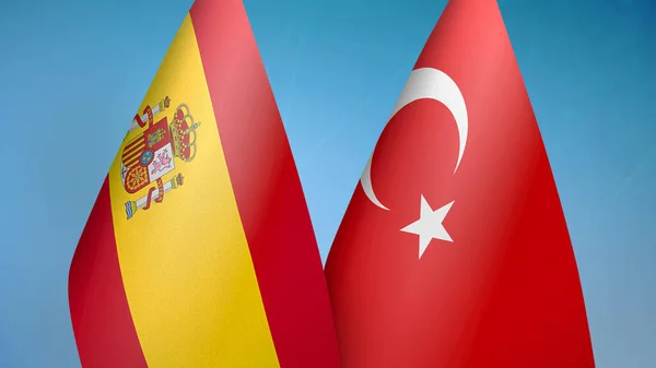 西班牙和土耳其两面旗帜 蓝色背景 — 图库照片