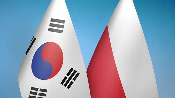 Corea Del Sud Polonia Due Bandiere Insieme Sfondo Blu — Foto Stock