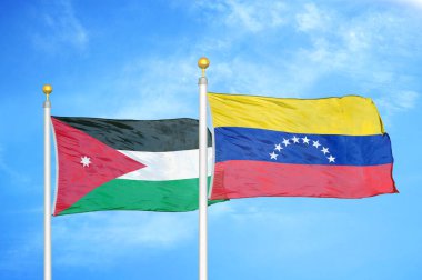 Ürdün ve Venezuela bayrak direğinde iki bayrak ve mavi bulutlu arka plan