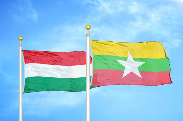 Hungary Myanmar Two Flags Flagpoles Blue Cloudy Sky Background — Stock Photo, Image
