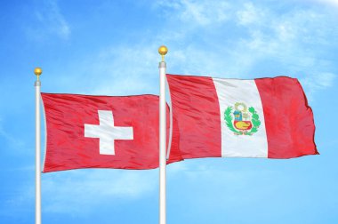 İsviçre ve Peru bayrak direkleri ve mavi bulutlu arka planda iki bayrak