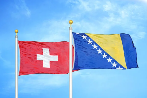 Suiza Bosnia Herzegovina Dos Banderas Sobre Asta Bandera Fondo Azul — Foto de Stock