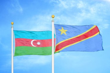 Azerbaycan ve Kongo Demokratik Cumhuriyeti bayrak direkleri ve mavi bulutlu arka planda iki bayrak