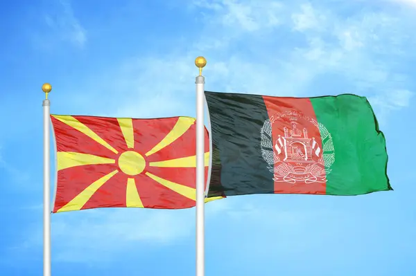 North Macedonia Afghanistan Two Flags Flagpoles Blue Cloudy Sky Background — Stock Photo, Image